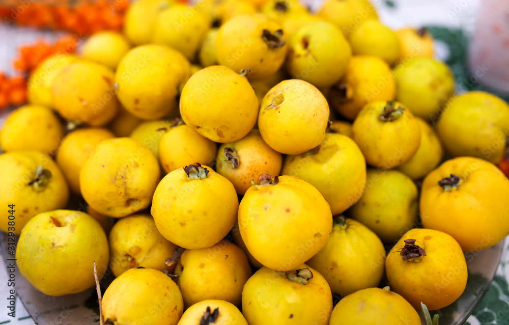 Yellow ripe quince in the market
