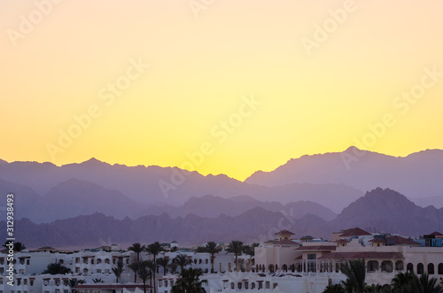Resort hotels against the backdrop of the mountains during sunset, Sharm El Sheikh, Egypt