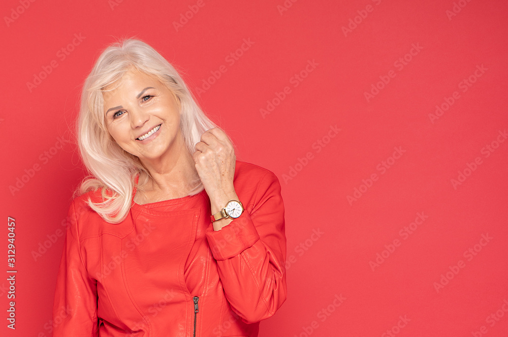 Senior lady in red fashionable clotes. Senior lady in red fashionable clotes.