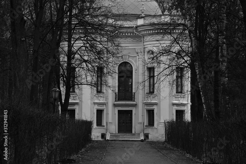 sculpture in kuskovo palace in Moscow. Black and white. facade of an old building. sculptures and decorative elements on the facade of buildings. 