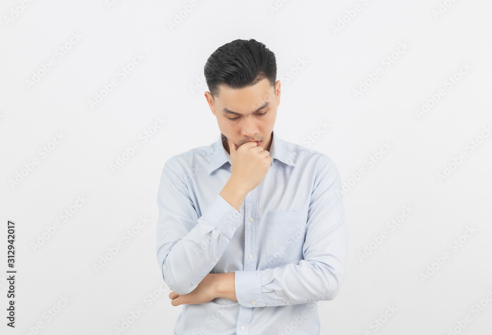 Young asian business man unhappy and frustrated with something. Negative facial expression isolated on white background. Young asian business man unhappy and frustrated with something. Negative facial expression isolated on white background.