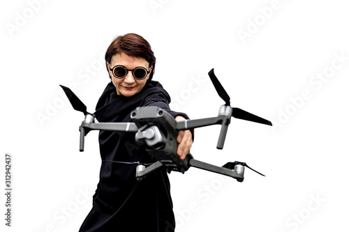 female spy in black clothes and round glasses with a drone isolated on white background