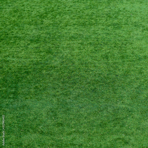 football field. Bright juicy perfect green grass. background. high image quality © TetiSof