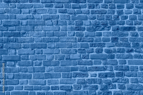 Blue Brick wall background. Texture of a brick wall. Modern wallpaper design for web or graphic art projects.