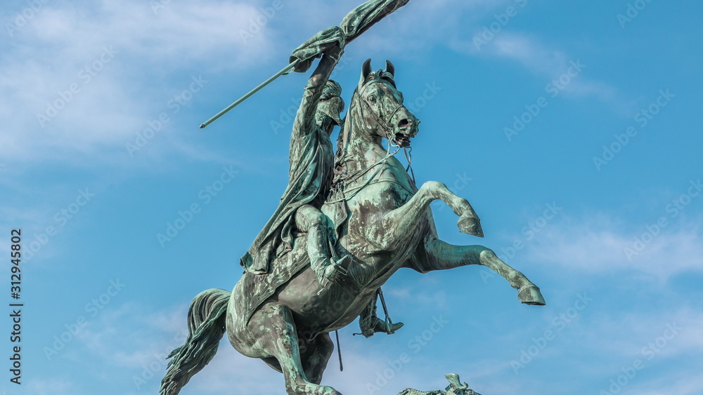 Statue rider Erzherzog Karl on horseback with flag in hand timelapse. Heldenplatz. Vienna Statue rider Erzherzog Karl on horseback with flag in hand timelapse. Heldenplatz. Vienna