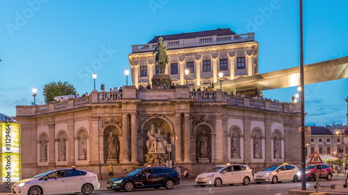 Photography Night view of equestrian statue of Archduke Albert in front of the Albertina Mus