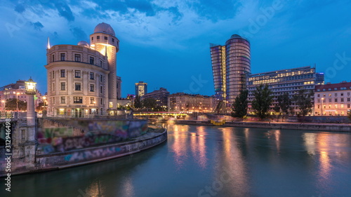 Urania and Danube Canal day to night timelapse in Vienna. photo