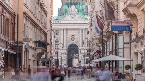 Kohlmarkt street with Hofburg Complex timelapse in downtown of Vienna in Austria with crowd in the street