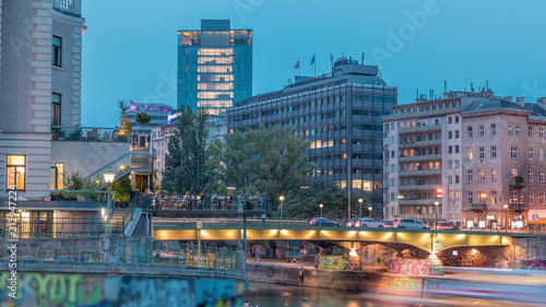Vienna cityscape with the Danube channel day to night timelapse in Vienna. Austria.