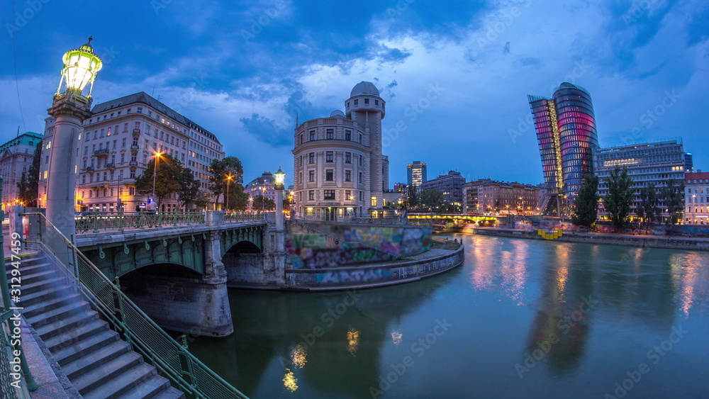Urania and Danube Canal day to night timelapse in Vienna.