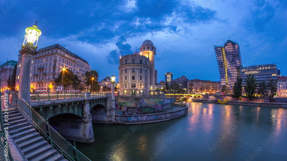 Urania and Danube Canal day to night timelapse in Vienna.