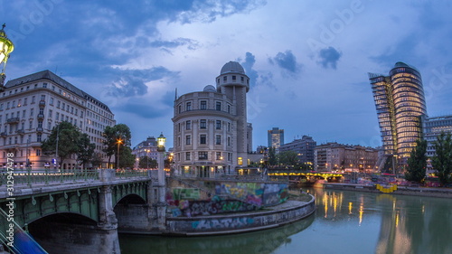Photography Urania and Danube Canal day to night timelapse in Vienna.