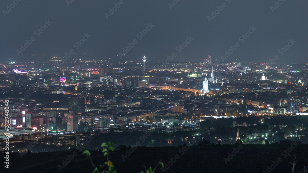 Obraz premium Skyline of Vienna from Danube Viewpoint Leopoldsberg aerial night timelapse.