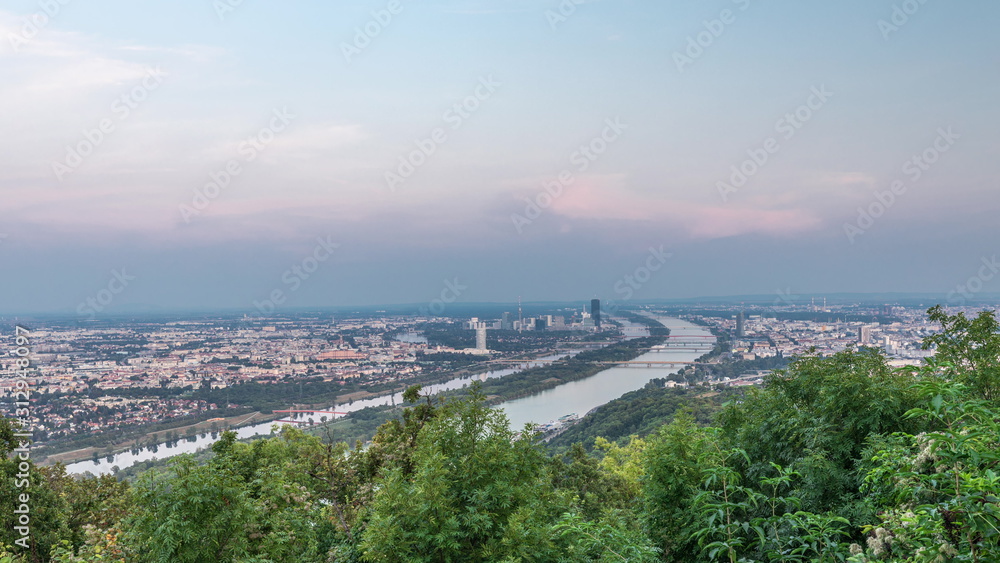 Skyline of Vienna from Danube Viewpoint Leopoldsberg aerial day to night timelapse.