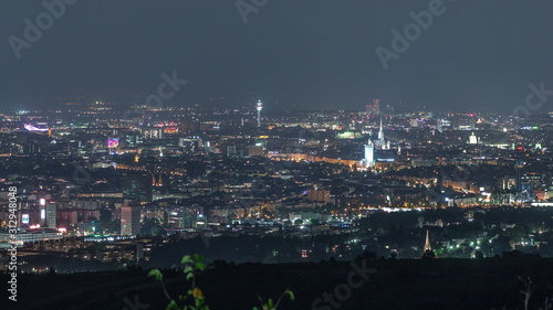 Skyline of Vienna from Danube Viewpoint Leopoldsberg aerial night timelapse.