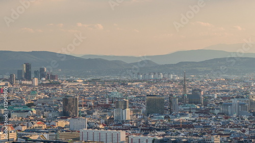 Photography Aerial panoramic view of Vienna city with skyscrapers, historic buildings and a riverside promenade timelapse in Austria
