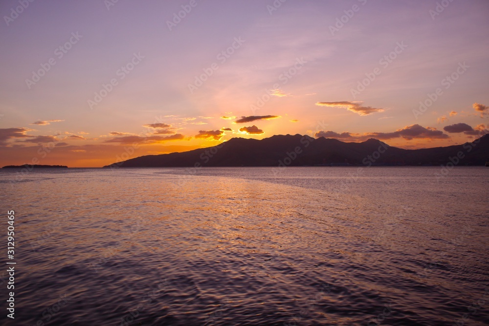 A brilliant sunset over the Zambales mountains of the Philippines