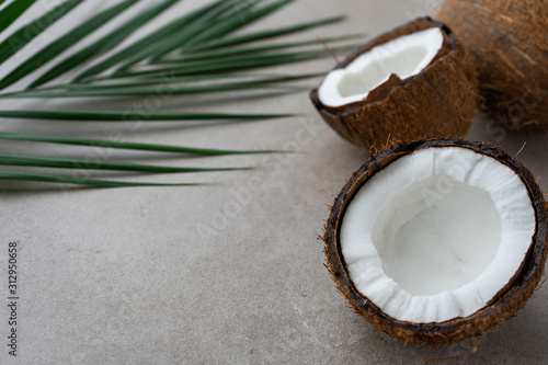 image of coconuts , whole and half ,
