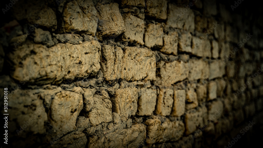 old wall made with adobe bricks old wall made with adobe bricks