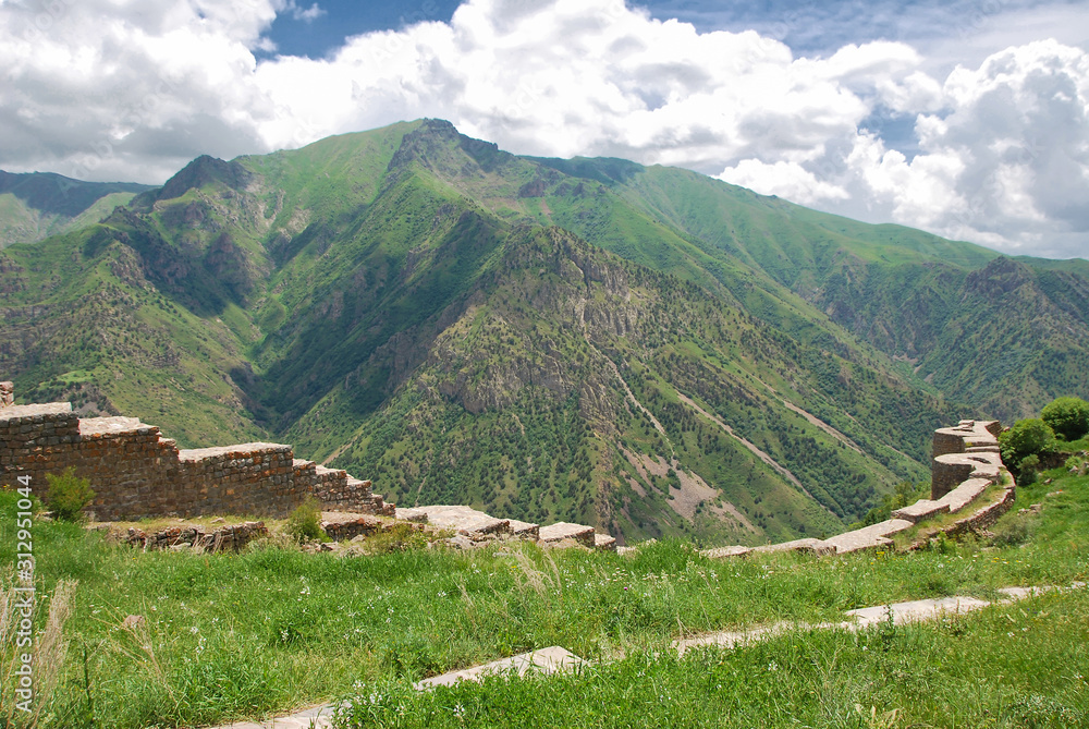 Fotografia do Stock: Smbataberd (Armenian meaning Fortress of Smbat Prince  of Syunik) is located upon crest of hill between villages of Artabuynk and  Yeghegis in Vayots Dzor in Armenia. Medieval Smbataberd Fortress.