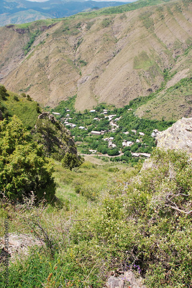 Fotografia do Stock: Smbataberd (Armenian meaning Fortress of Smbat Prince  of Syunik) is located upon crest of hill between villages of Artabuynk and  Yeghegis in Vayots Dzor in Armenia. Medieval Smbataberd Fortress.