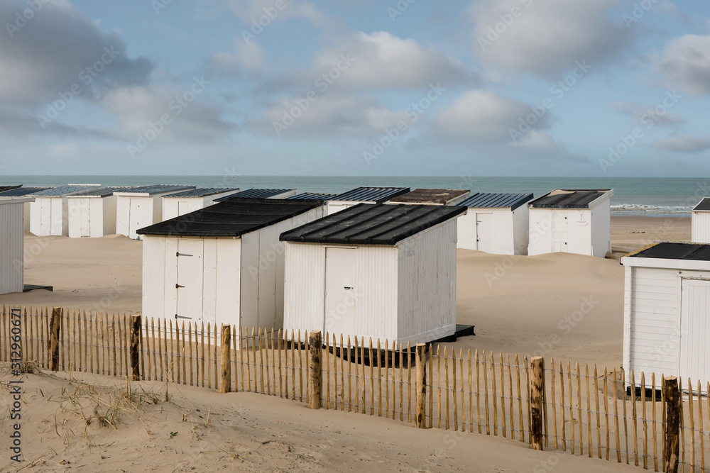 sunset over the beach huts in the north of France