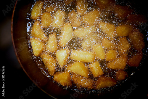 Tofu fritters in hot oil