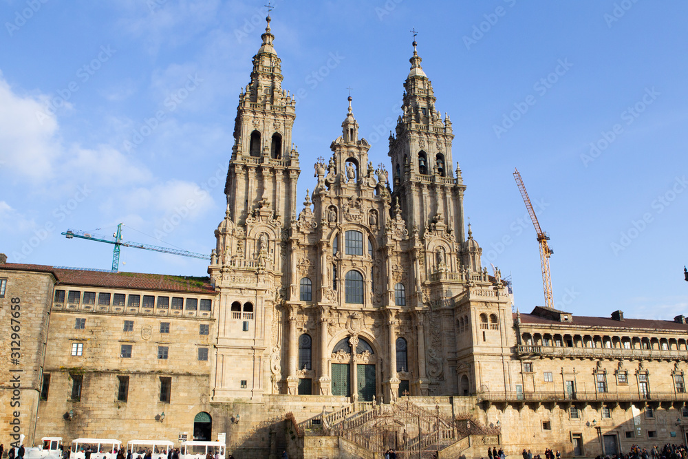 view of the main baroque facade of the cathedral of Santiago de Compostela in the obradoiro square on December 6, 2019