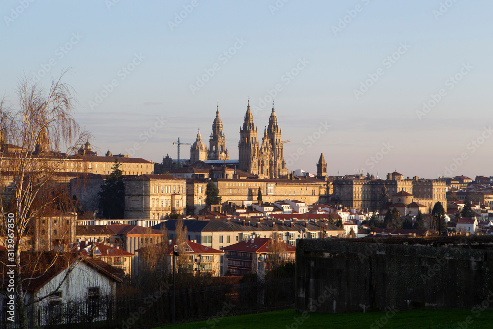 Santiago de Compostela, Spain. view of the main baroque facade of the cathedral among more buildings of Santiago de Compostela on December 6,2019