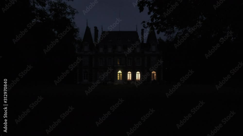 establishing shot of haunted old scary creepy castle at night establishing shot of haunted old scary creepy castle at night