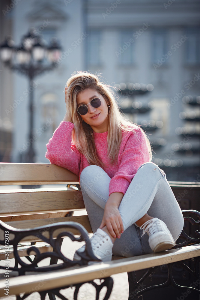 Beautiful young girl on a walk in the autumn city Beautiful young girl on a walk in the autumn city