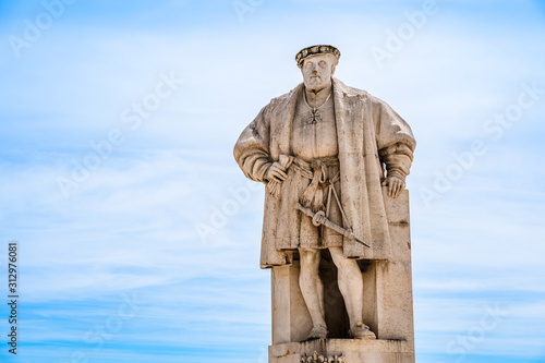 Statue of King John III João III in the main square of the University of Coimbra, Portugal