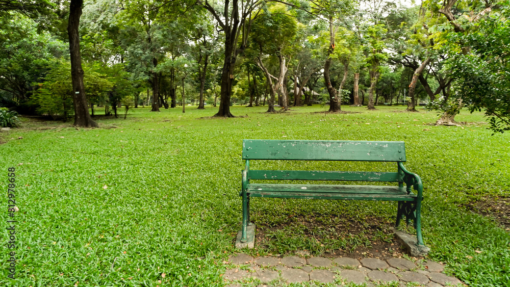 Bench chair in the park. Feeling alone but relaxing. Bench chair in the park. Feeling alone but relaxing.