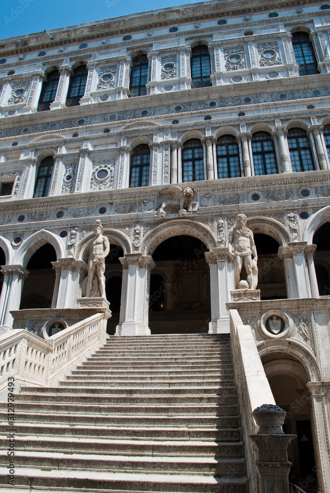 Venice, Italy:  Doge's Palace courtyard, Giants' Staircase. Statues of Mars and Neptune guard the top of the staircase