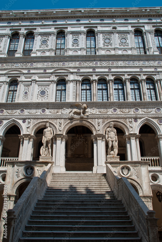 Venice, Italy:  Doge's Palace courtyard, Giants' Staircase. Statues of Mars and Neptune guard the top of the staircase