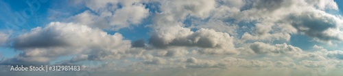 Fototapeta Naklejka Na Ścianę i Meble -  Fantastic clouds against blue sky, panorama