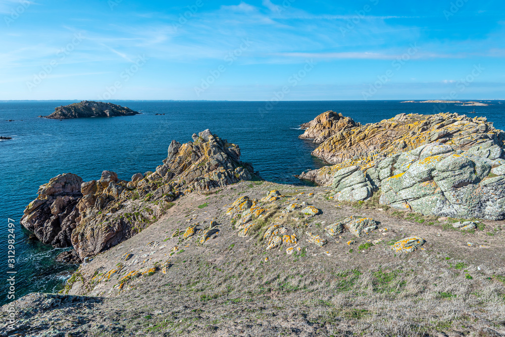 View from Beg er Vachif peninsula in west of Houat island in French Brittany. Guric islet is at left background. View from Beg er Vachif peninsula in west of Houat island in French Brittany. Guric islet is at left background.