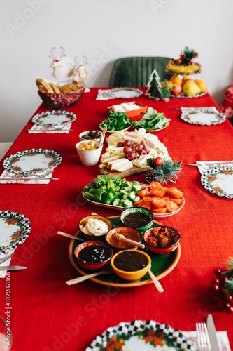 New Year Breakfast at home. Homemade Breakfast with family with red background. Traditional Turkish Breakfast. ( Selective focus)