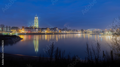 Deventer skyline, blue hour at the river IJssel