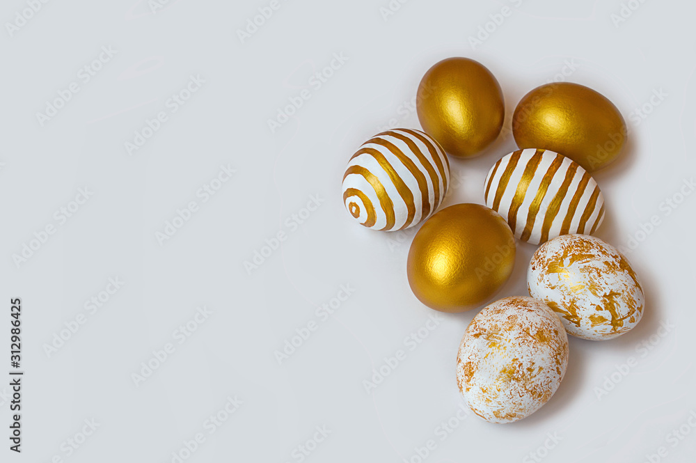 Easter eggs on white background with copy space. Easter background. Top view