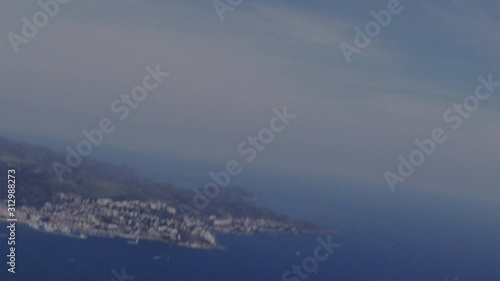 Aerial view from a point of view of a parachute flying