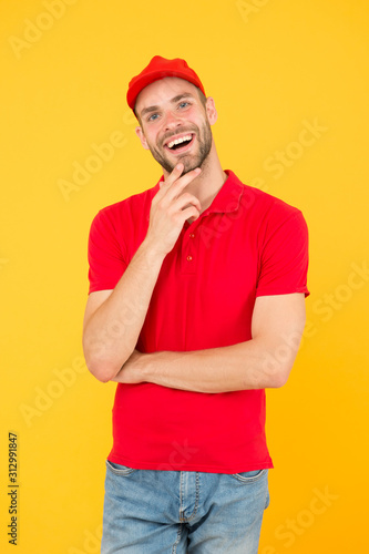 Free cashier. Hiring shop store worker. happy guy cashier uniform. Restaurant cafe staff wanted. man delivery service in red cap. friendly shop assistant. food order deliveryman. I am a cashier photo