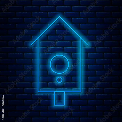 Glowing neon line Retro wall watch icon isolated on brick wall background. Cuckoo clock sign. Antique pendulum clock. Vector Illustration