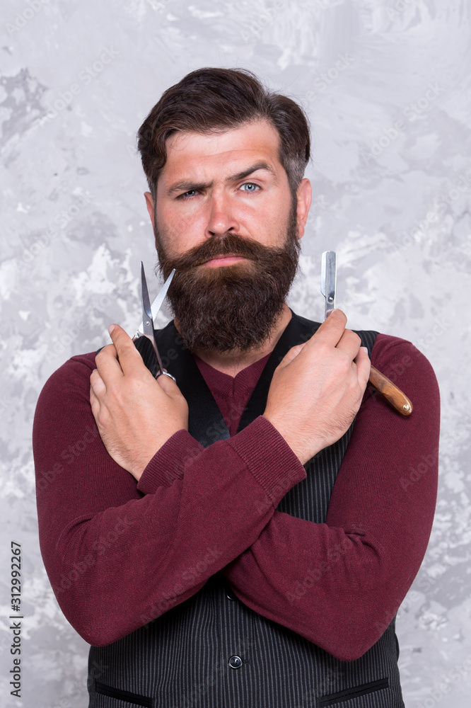 confident man cut beard. brutal master. bearded barber ready