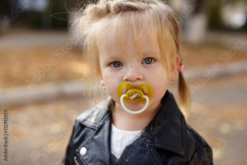 toddler with dummy