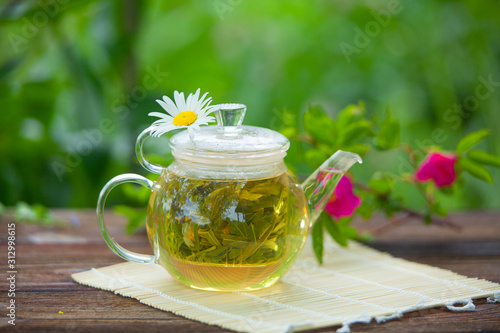 green tea with chamomile in cup