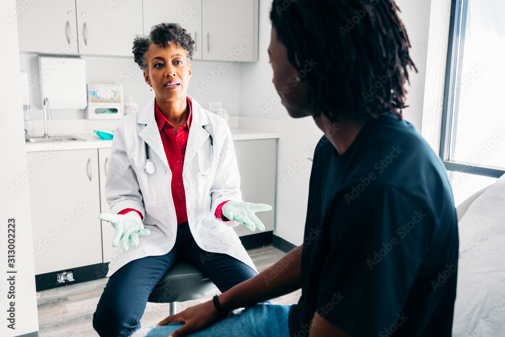 Doctor talking with male patient Doctor talking with male patient