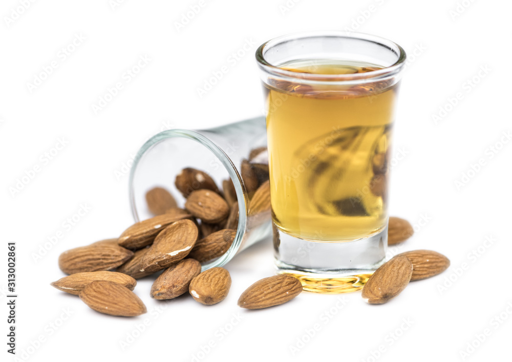 Amaretto Shots isolated on white background (selective focus; close-up shot) Amaretto Shots isolated on white background (selective focus; close-up shot)