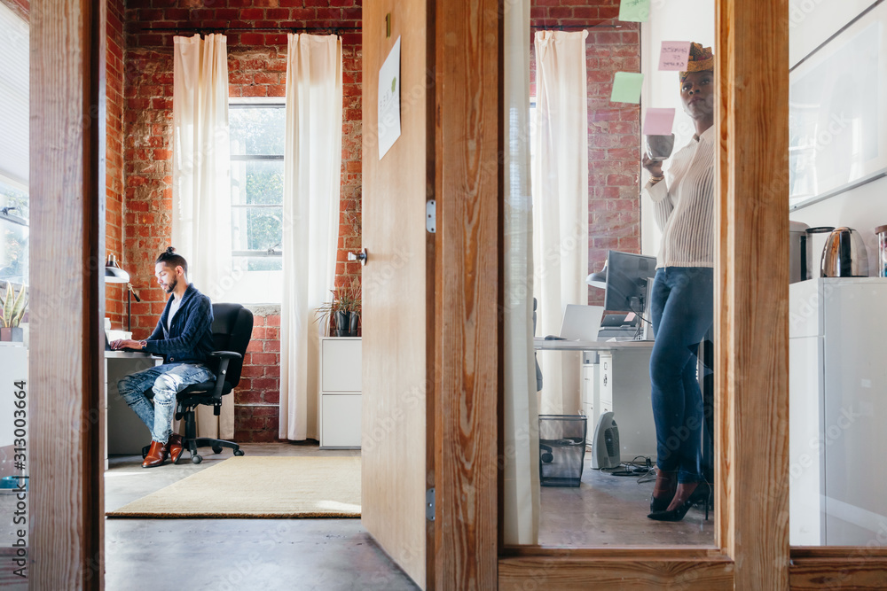 Woman leading brainstorming session