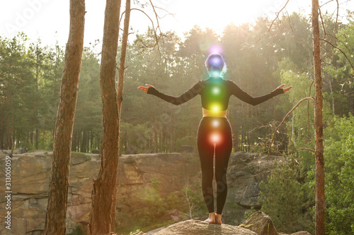Woman with colorful chakras...